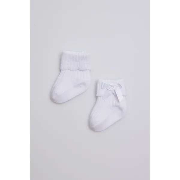 Chaussettes côtelées avec noeud nouveau-né blanc