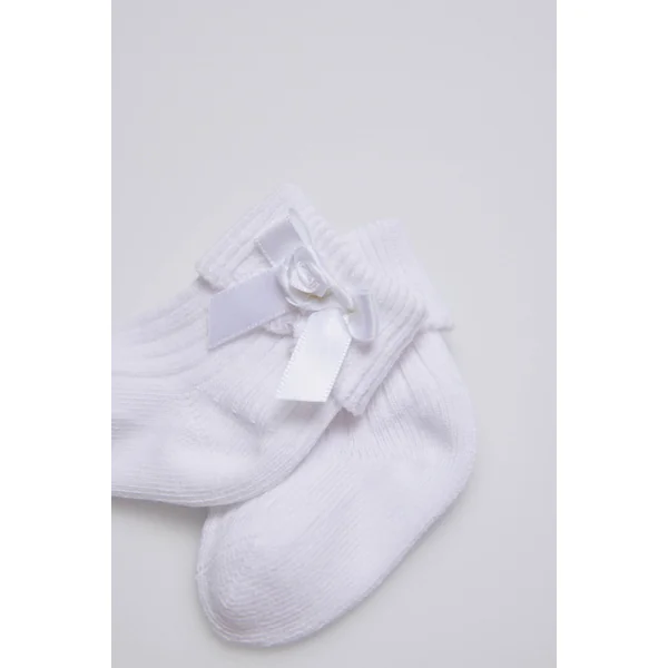 Chaussettes côtelées avec noeud nouveau-né blanc