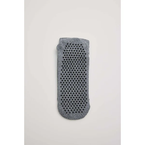 Chaussettes grises de yoga et de pilates