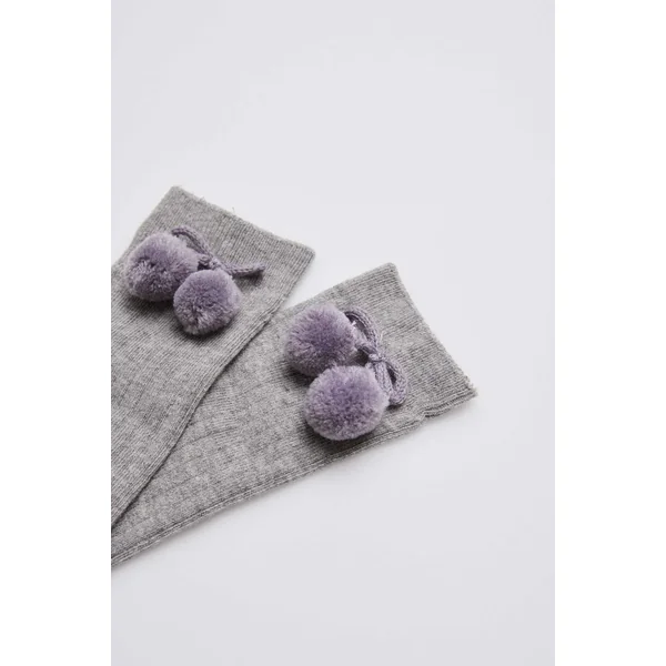 Chaussettes longues pompon grises