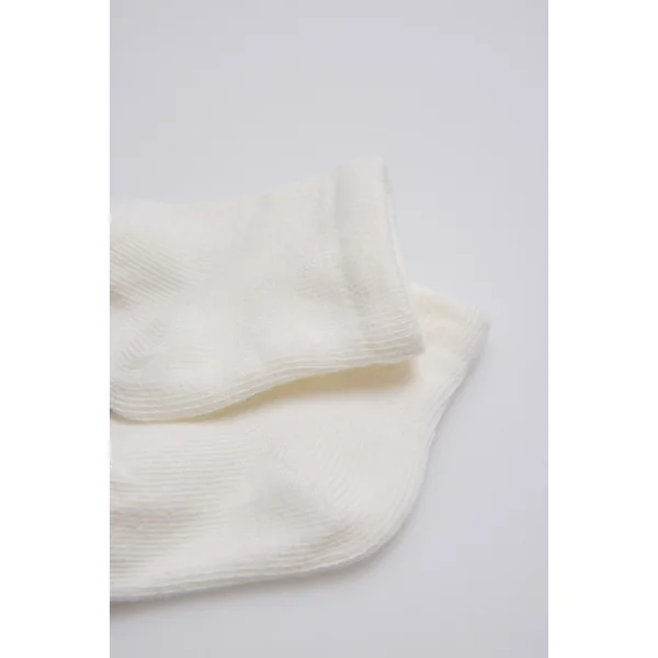Chaussettes naissance basiques ivoire