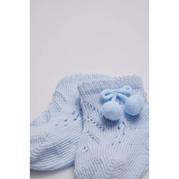 Chaussettes nouveau-né perles bleu clair à pompons