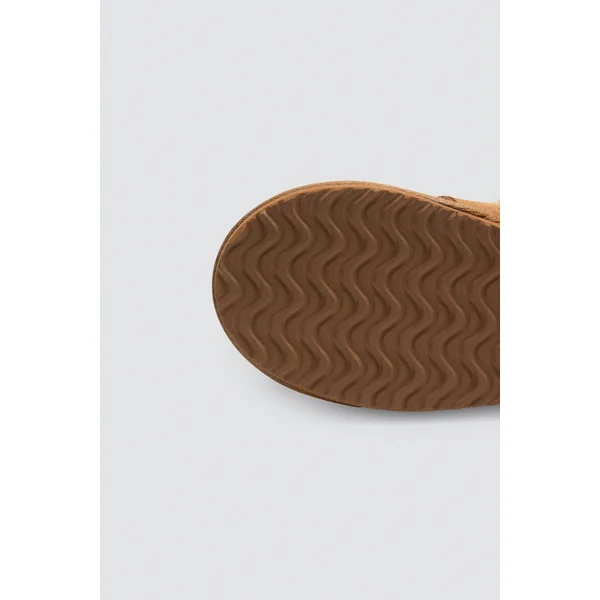 Chaussons avec boucle et peau de mouton