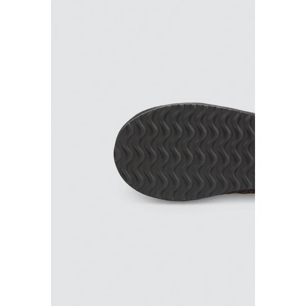 Chaussons de maison avec extérieur en peau de mouton