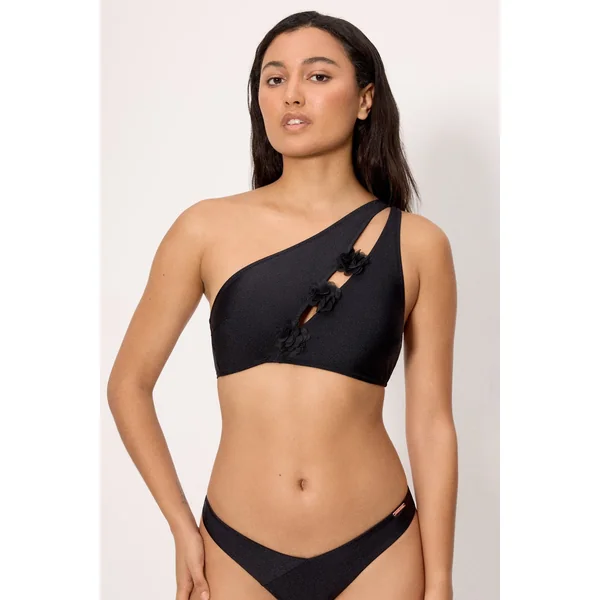 Haut de bikini asymétrique noir à paillettes et détails floraux.