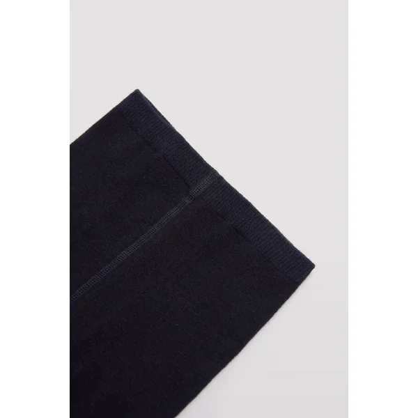 Justaucorps fille détail pompon marine