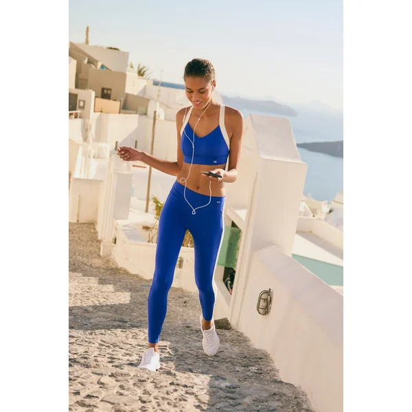 Leggings de sport longs bleus à effet push-up avec bande contrastante