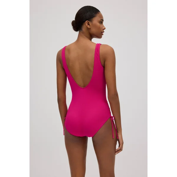 Maillot de bain gainant en piqué avec détail nœud fuchsia