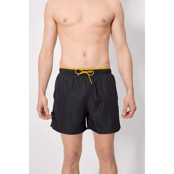 Maillot de bain une pièce noir, avec détail à la taille.