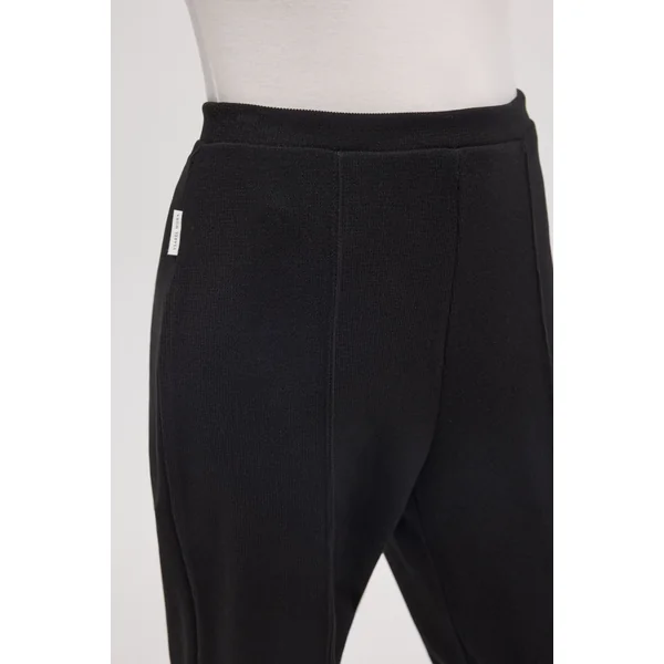 Pantalon noir effet velours côtelé