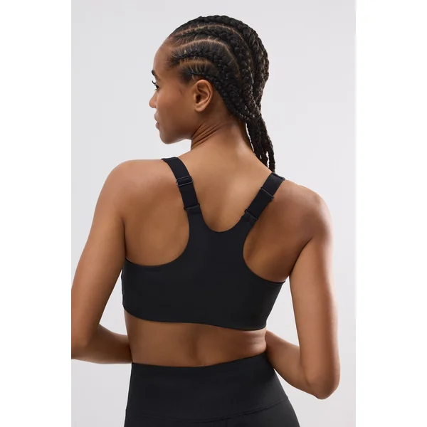 Soutien-gorge de sport noir à maintien élevé et fermeture sur le devant