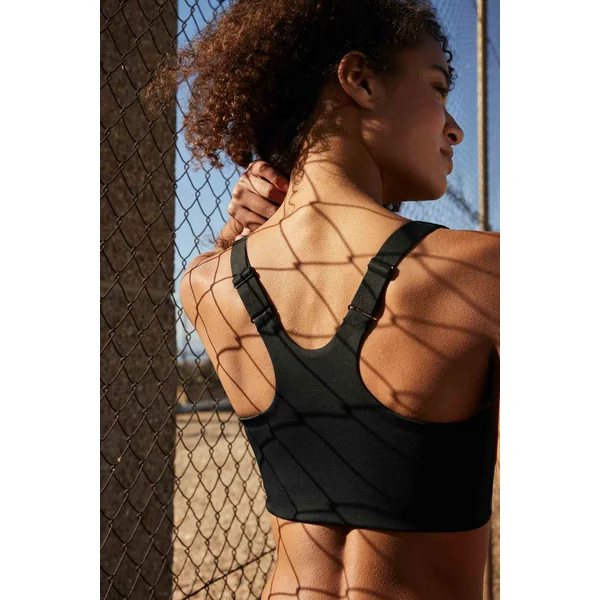 Soutien-gorge de sport noir à maintien élevé et fermeture sur le devant